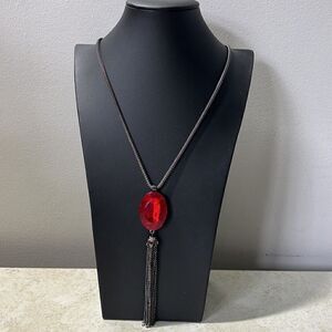 Gunmetal Tone With Large Red Stone and Tassel